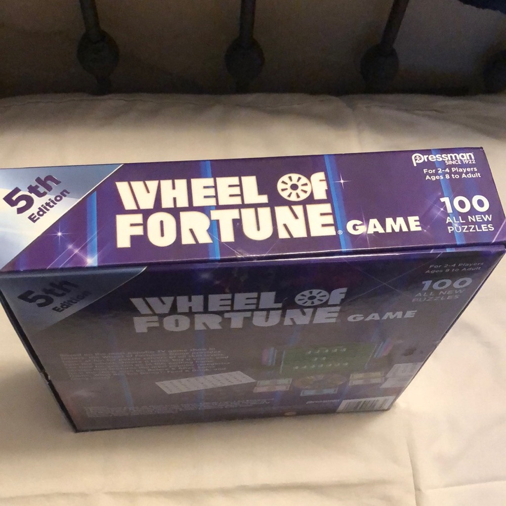 Blue and Red Puzzle Game with Vibrant Wheel - Picture 4 of 4